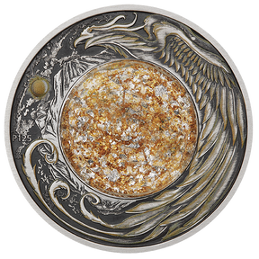 Decorative coin with intricate designs and a central circulardome with gold and silver metallic flakes in fluid on a transparent background