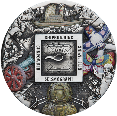 Ancient Chinese Inventions silver coin reverse, with coloured ship, kites, cannon and seismograph surrounding a sculpted spoon compass.