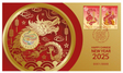 A commemorative postage stamp and coin cover for the 2025 Chinese New Year, featuring a gold dragon design on a red background with fireworks, along with the Chinese characters for 'Happy New Year' and the year '2025'. The cover also includes a 'P' mintmark and Australia Post's special New Year Post Mark.