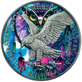 A colorized and antique-finished silver coin with an owl design, symbolizing wisdom, intuitive knowledge, and intelligence. The coin features vibrant blue and pink hues in the background, with a detailed depiction of an owl in flight.