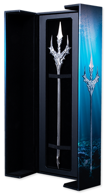 Decorative trident in a black stand with a blue underwater-themed background