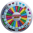 Colorful Monopoly spinner with various game actions on a white background