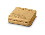 Wooden coin box with engraved design and text on a white background