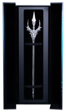Decorative trident in a black display case