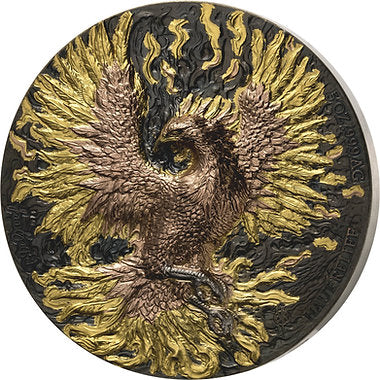 Decorative coin with a gold and bronze phoenix design on a white background
