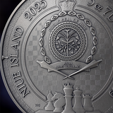 Close-up of a silver coin with detailed embossed design and text