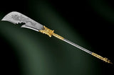 Decorative weapon with gold and silver design on a dark background