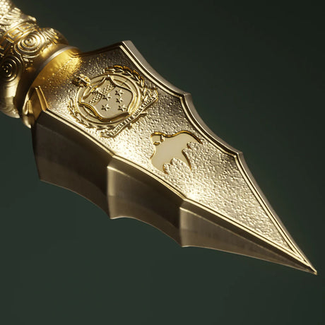 Decorative dagger with gold handle and blade on a dark background