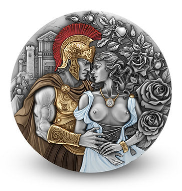 Decorative coin featuring a classical scene with a man and woman embracing, surrounded by roses and architectural elements.