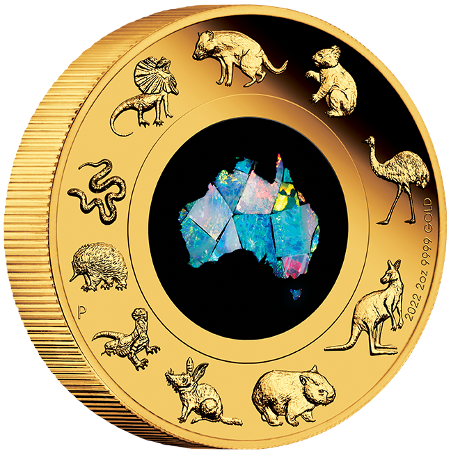 A 2oz gold coin featuring an opal insert with an image of the Australian continent and various Australian animals around it, including a kangaroo, emu, and koala. The coin also shows the profile of Queen Elizabeth II and the denomination of $200.