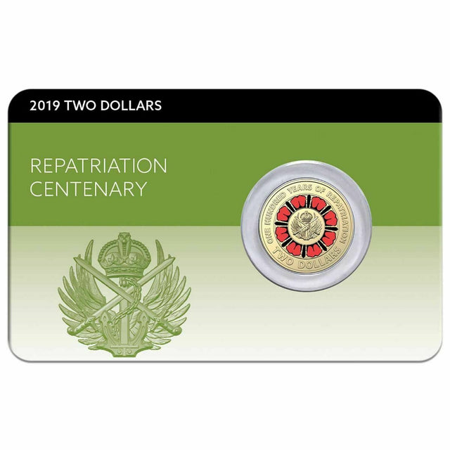 Front of Australia’s 2019 $2 Repatriation Centenary coin pack, showing the red poppy coin mounted on a green commemorative card.