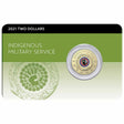 Front of Australia’s 2021 $2 Indigenous Military Service coin pack, showing the coloured handprint design mounted on a green commemorative card.