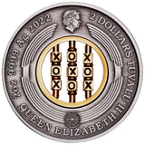 The antiqued silver obverse of the 2022 Tuvalu $2 coin. It features the right-facing profile of Queen Elizabeth II designed by Ian Rank-Broadley. Surrounding the portrait are a stylized circular matrix pattern and inscriptions detailing the monarch's name, monetary denomination, year-date, weight, and silver purity.