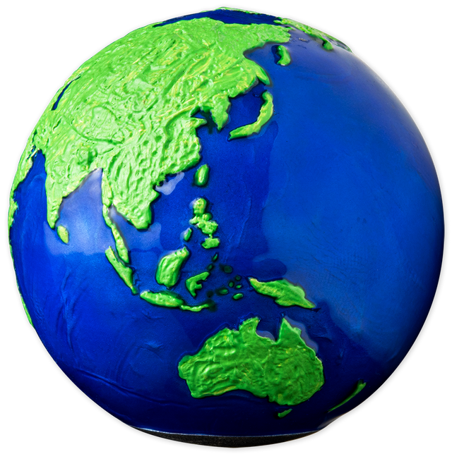 Asia and Australia: Blue Marble Green Planet Earth silver sphere coin showing green Asia and Australia against blue oceans.
