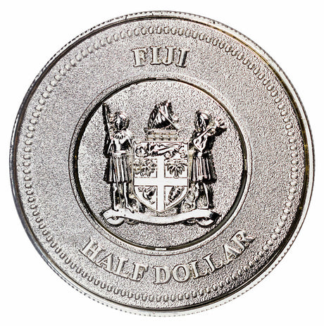 Fiji coat of arms on the Iron Man coin obverse, with FIJI and HALF DOLLAR inscriptions.