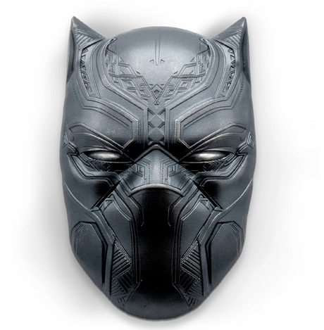 Fiji 2021 $2 Black Panther Mask 2oz Antiqued Silver Coin Perth Mint - A metallic black panther mask with intricate geometric engravings, displayed against a dark blue satin fabric background.Reverse