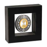 A thick Black bordered Display Case with transparent Latex which keeps the coin suspended in space. Reverse of Coin is on display.