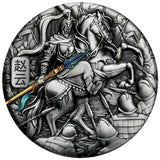 Tuvalu 2021 $5 Zhao Yun 5oz Antiqued Silver Coin Reverse: A circular silver-toned relief medallion featuring a detailed equestrian warrior scene with a Chinese character on the left, set against a dark blue satin-like background.