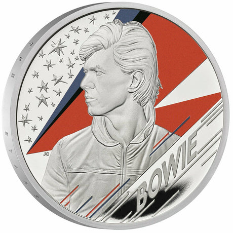 United Kingdom 2020 £2 David Bowie .999 Silver Proof Coin. The reverse design showcases a striking portrait of David Bowie against a backdrop of a lightning bolt—a symbol synonymous with his chameleonic career and boundary-pushing artistry. This special edition boasts a meticulous Proof finish, highlighting the contrast between the frosted details and mirror-like fields, enhanced by vibrant colour applications that bring the design to life.